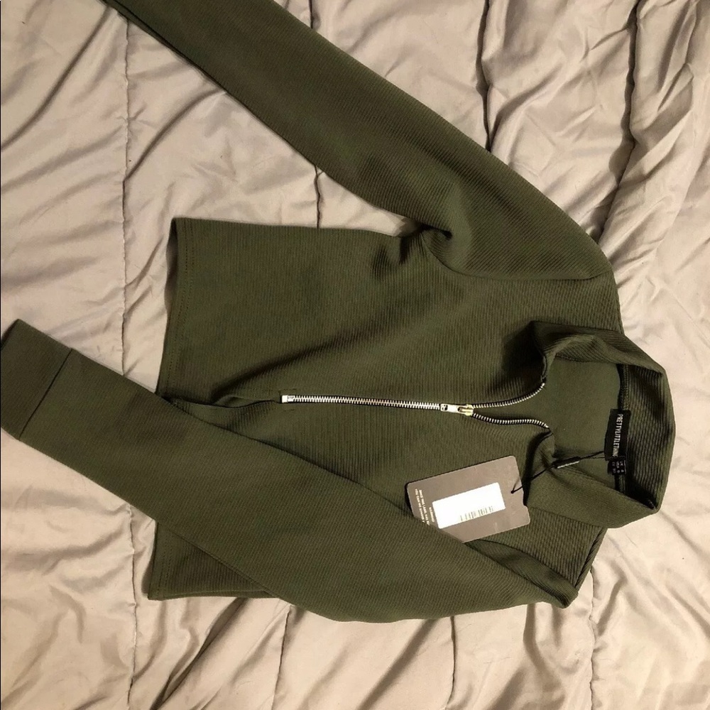 PLT zip up jacket size xs.